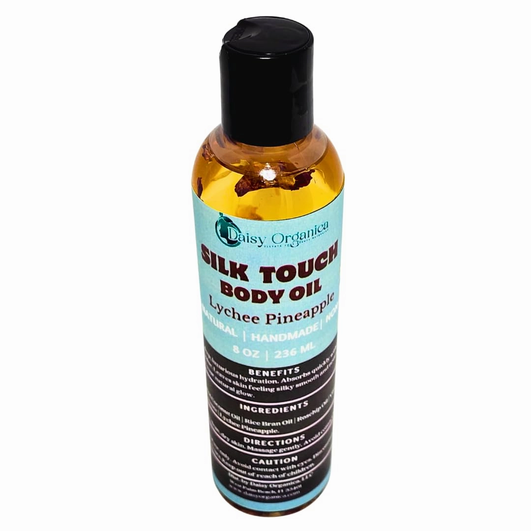 Silk Touch Body Oil - Hydrating & Nourishing. Two variables scent: Sandalwood Vanilla/Lavender & Lychee Pineapple (Sandalwood Vanilla & Lavender)
